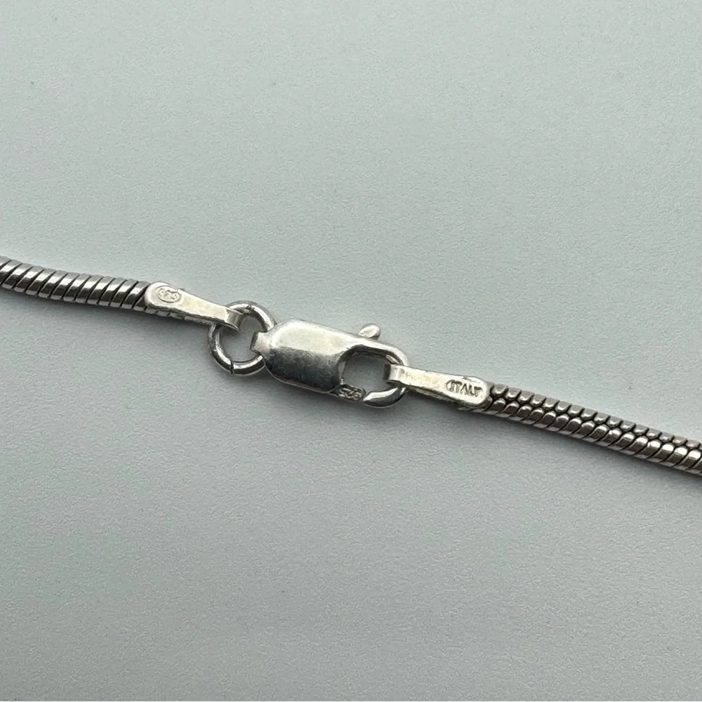 Sterling Silver Genuine Blue Topaz Triple Drop Pendant Snake Chain